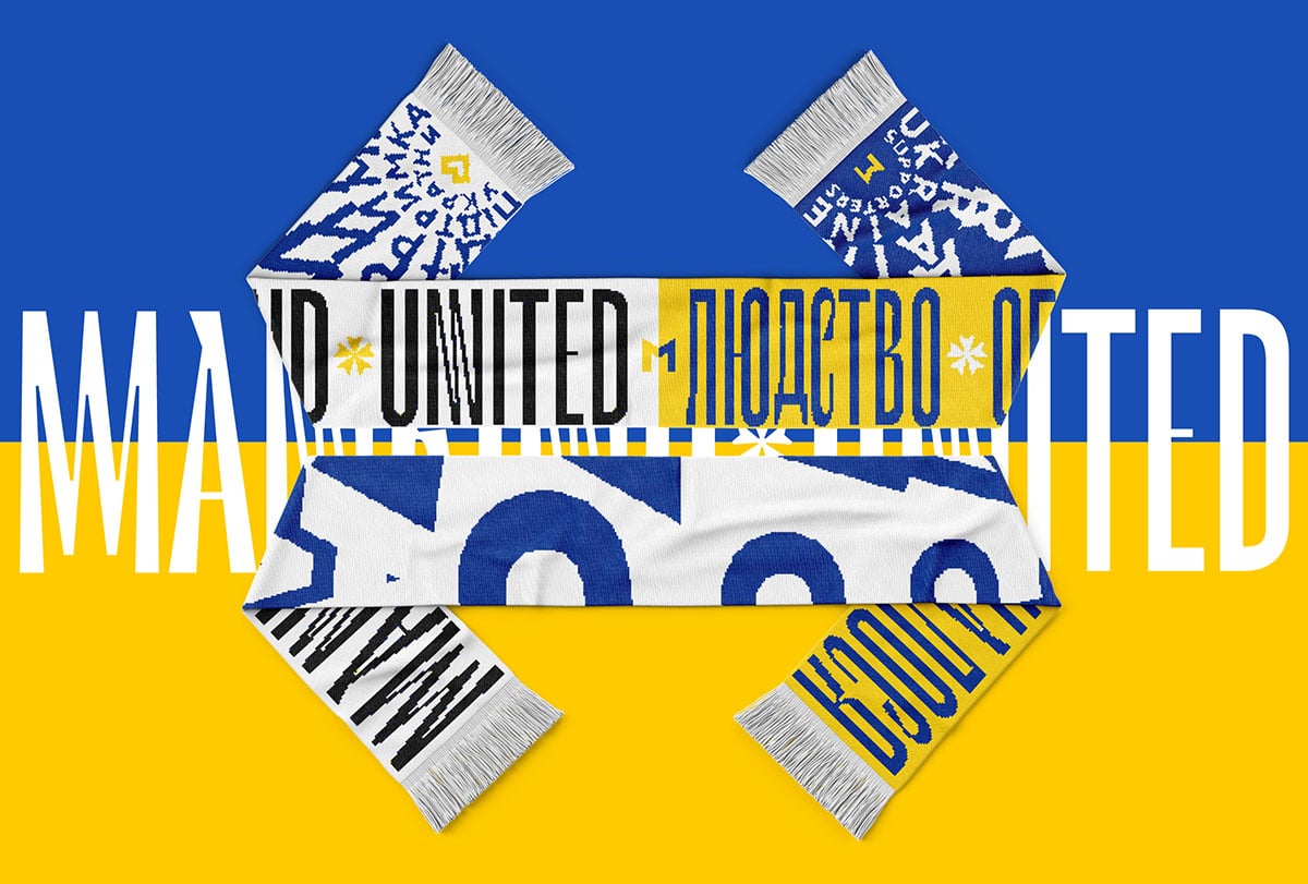 Zwei Ansichten des Schals mit dem Slogan »Manind United«