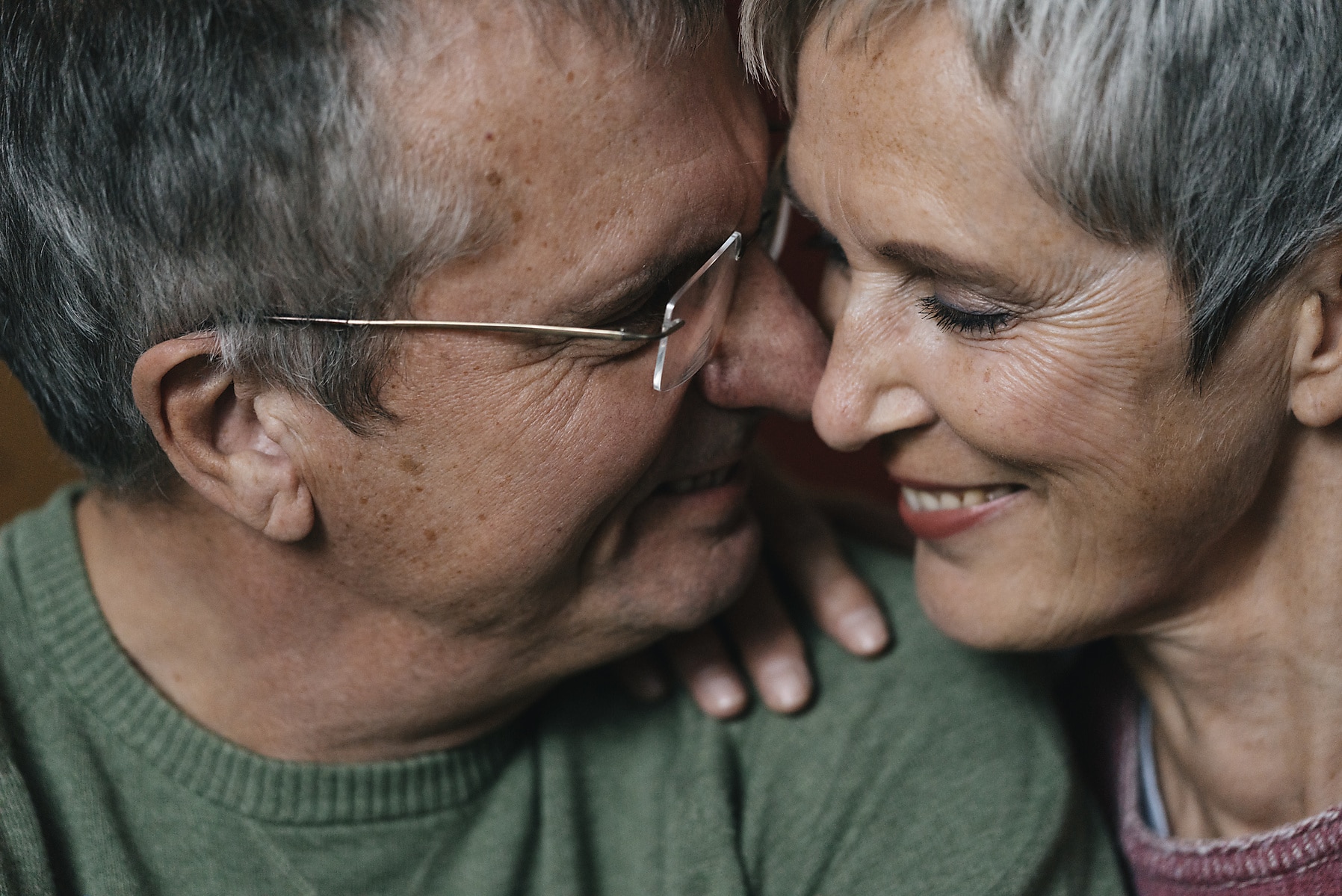 Close-up of happy affectionate senior couple