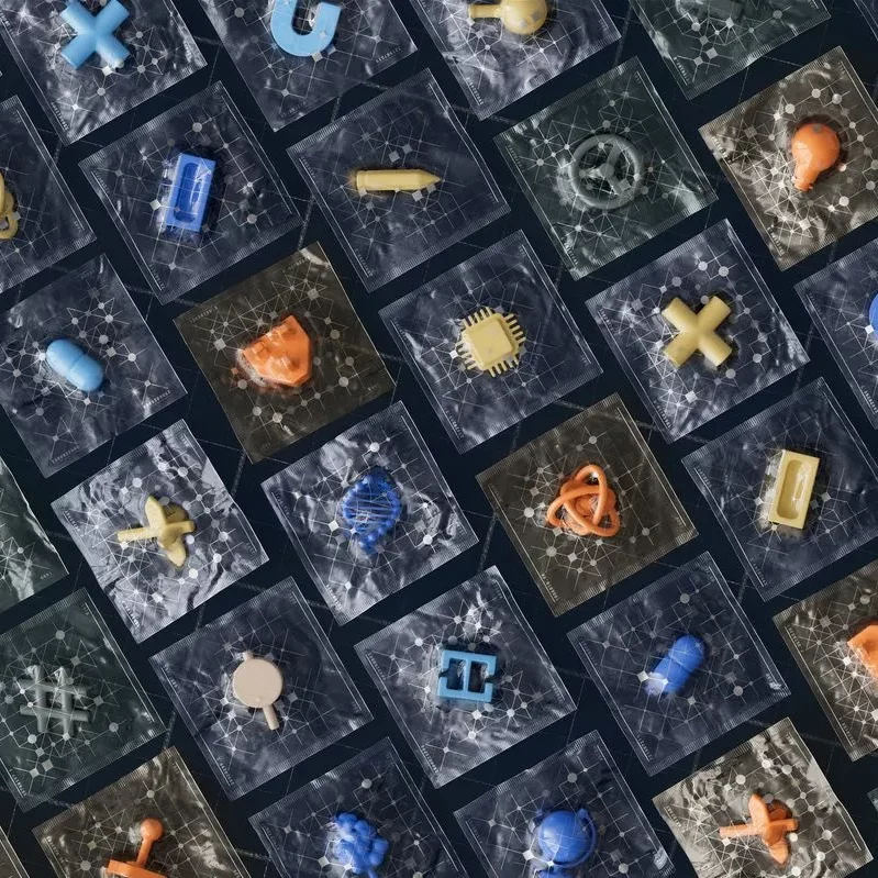 Eine Reihe abgepackter 3D Symbole in durchsichtigem Plastik