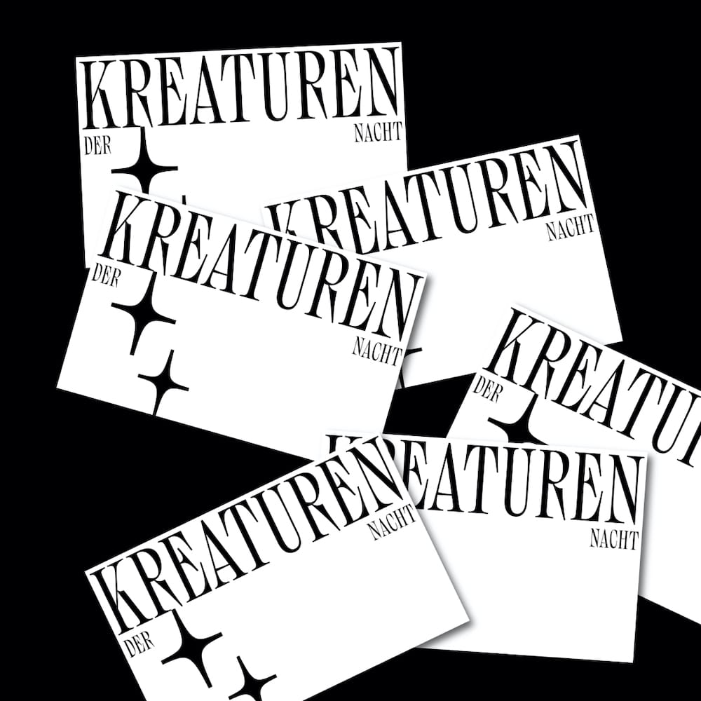 Visitenkarten mit dem Serifenfont Kreatur
