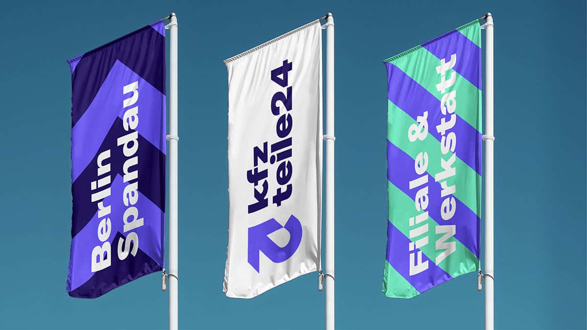 drei flaggen mit dem neuen kfzteile24 logo