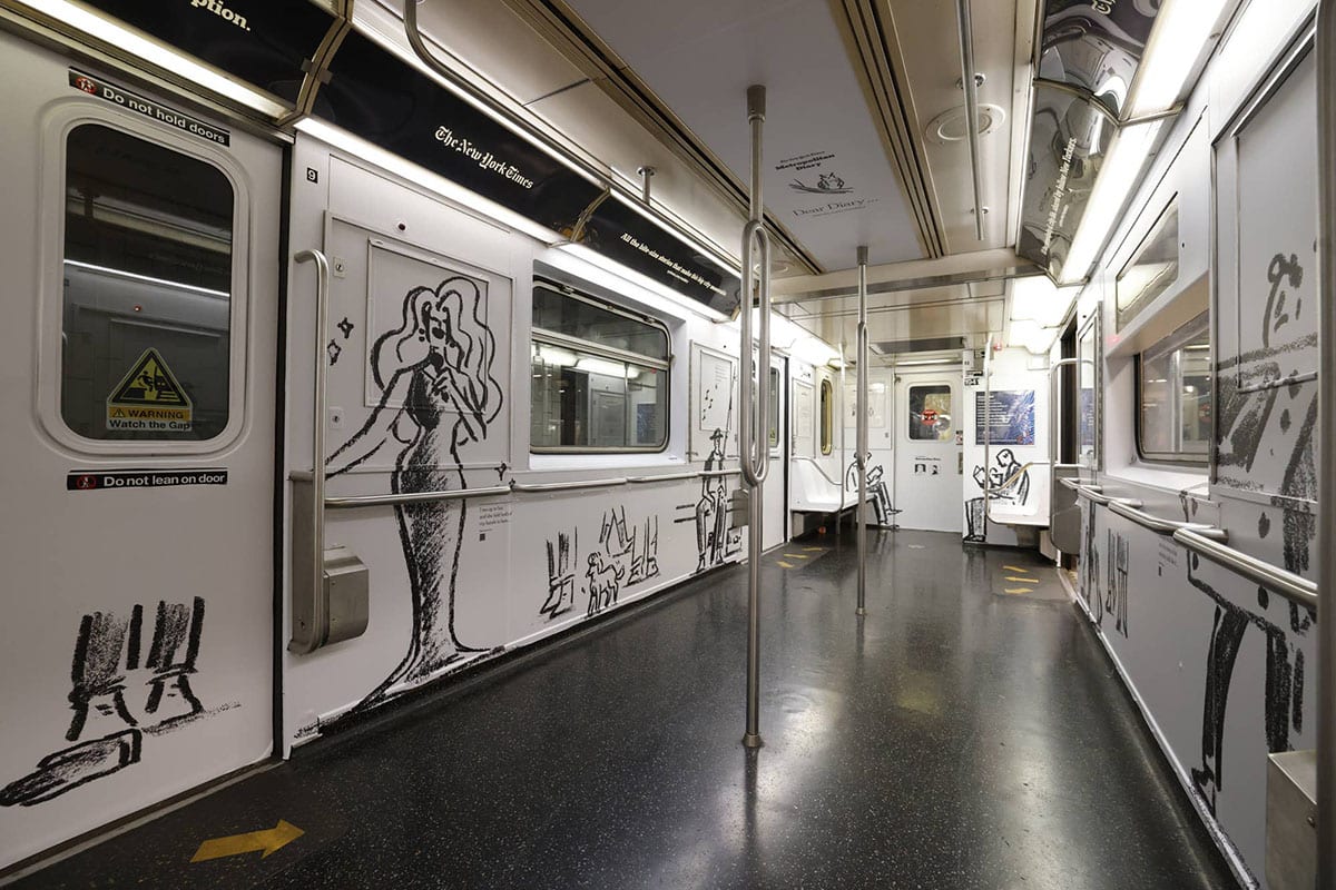 Das wageninnere eines weißen subway cart mit illustrierten wänden