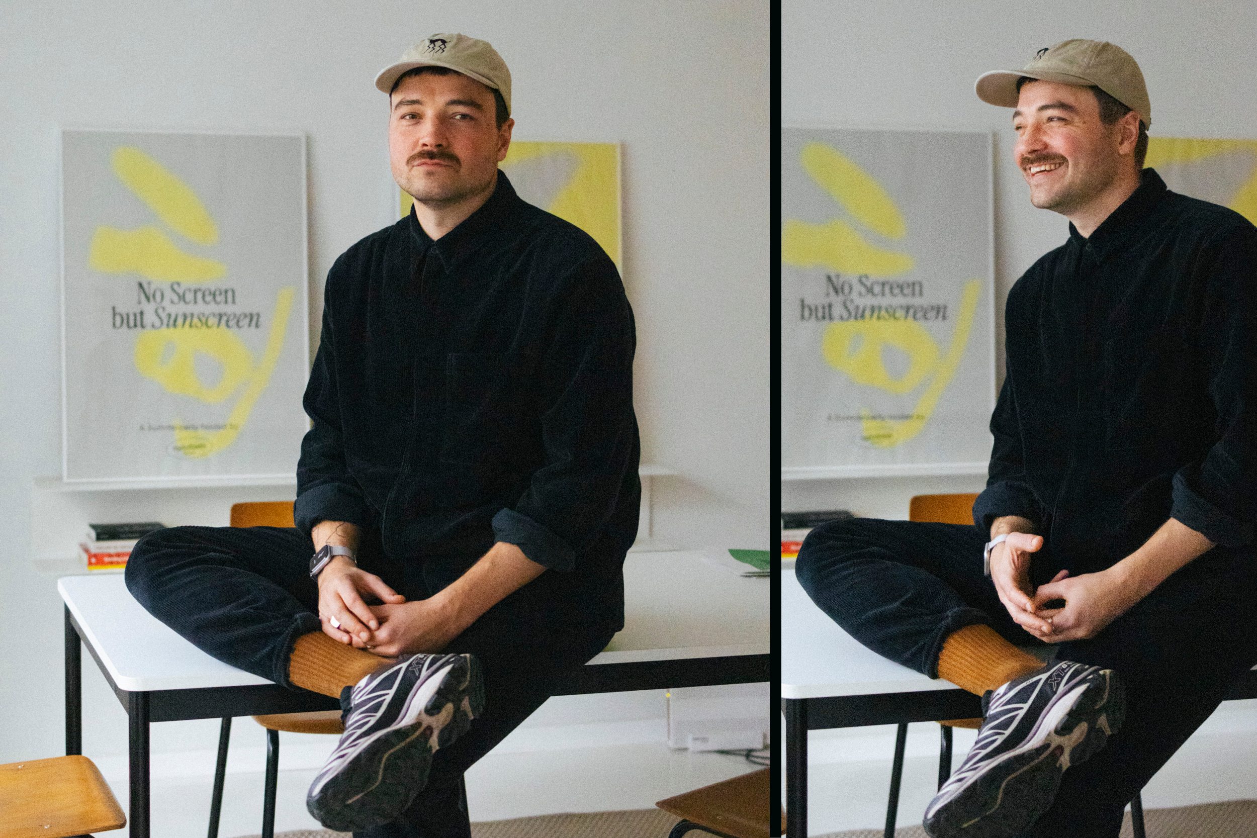 Florian Kleinsteuber sitzt auf einem Tisch, schwarz gekleidet mit Mütze