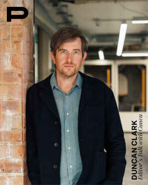 Portrait von Duncan Clark, Head of Canva EMEA. Er lehnt an einer Wand